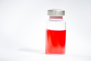 Injection vial on white