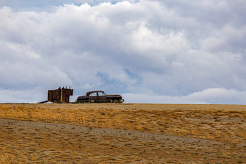 Abandoned Vintage Automobile in a Field in Wyoming