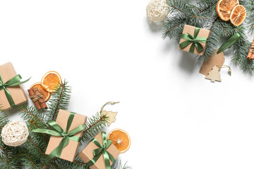 Christmas zero waste, eco friendly packaging. Festive Christmas composition packs gifts in kraft paper on a light table, eco Winter weekend concept, eco decor