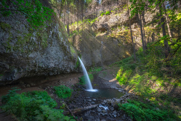 Upper Horsetail Falls flowing over a cave