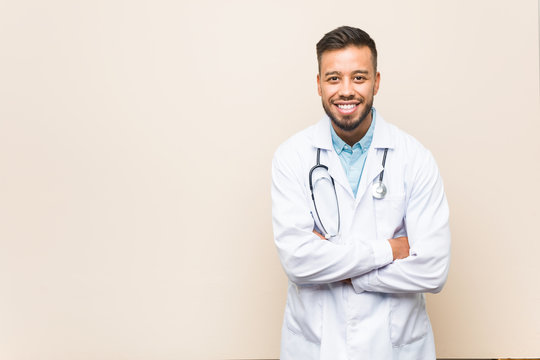 Young South-asian Doctor Man Laughing And Having Fun.