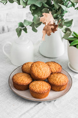 Simple almond muffins on the table. Cozy kitchen still life, dessert table