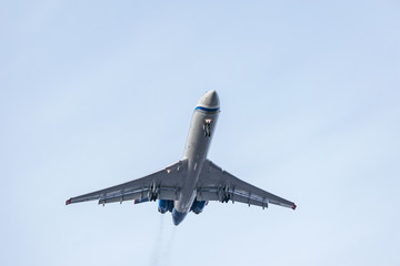 Landing of the passenger plane at evening time.