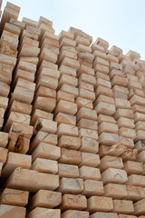 Wooden planks. Beams. Air-drying timber stack.