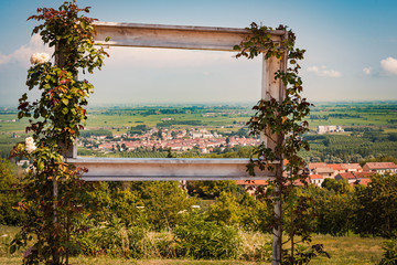 Frame with view of Pianura Padana from panoramic viewpoint of Coniolo Monferrato