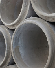 Stack of new concrete pipes.