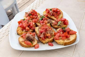 Appetizer of bruschetta with tuna
