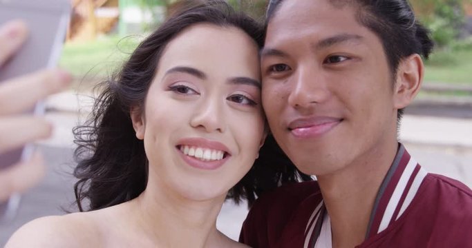 Young attractive couple take a selfie.  - Slow Motion - shot on RED