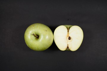 top green apples on isolate black background