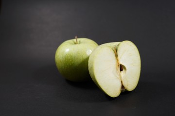 green apples on isolate black background