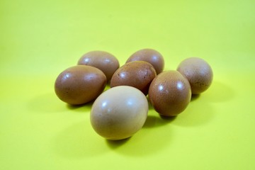 eggs isolated on yellow background