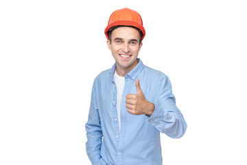Builder in hardhat, man smiling and shows thumb up, isolated background, copy space
