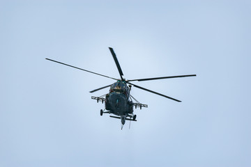 Fototapeta na wymiar Military helicopter landing at evening day time.