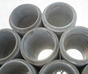 Stack of new concrete pipes.