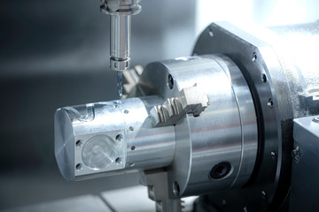 Metal cutting and forming using CNC machines, high precision technology in the machinery industry.