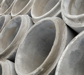 Stack of new concrete pipes.