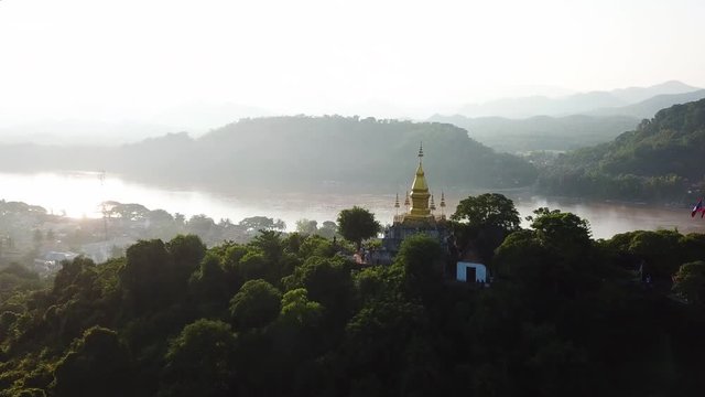 Laos Mount Phousi Cinematic Aerial With Overview on Mist Over Mekong River and Luang Prabang City