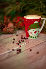 cup of coffee on wooden background