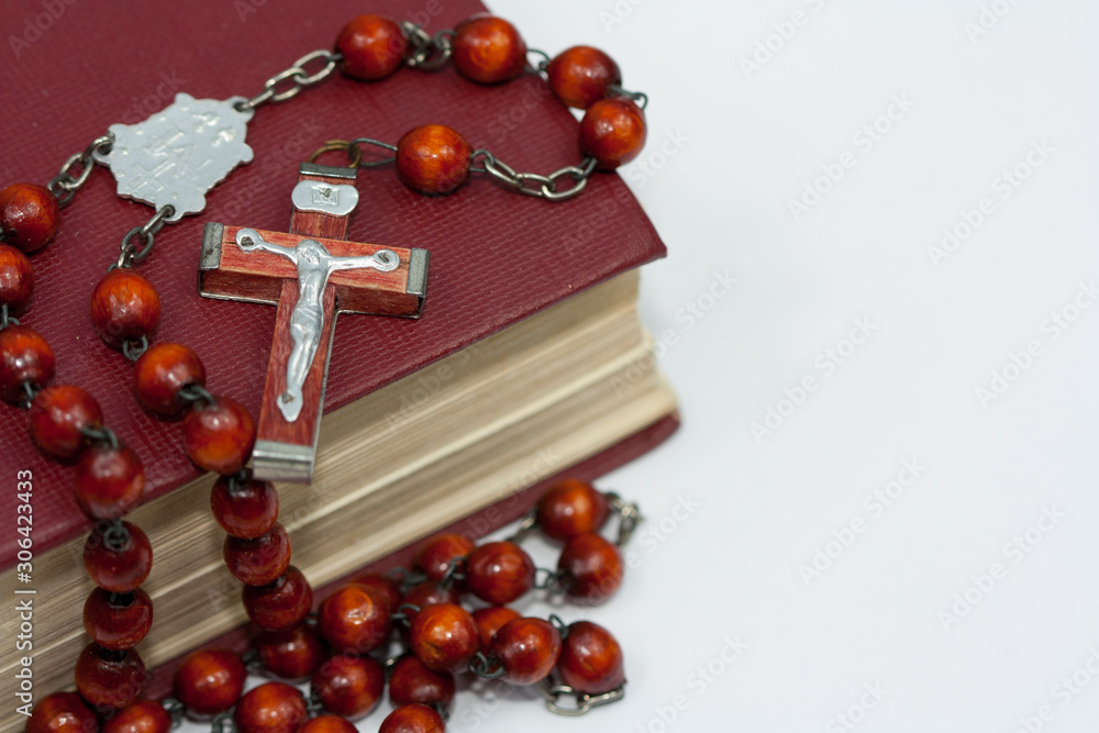 Wall mural rosary and book.