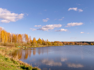 Obraz premium colorful autumn landscape by the lake, golden autumn, colorful trees and reflections
