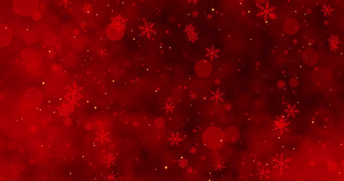 Red confetti, snowflakes and bokeh lights on the red Christmas background.