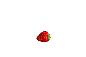 single fresh red strawberry isolated on white background