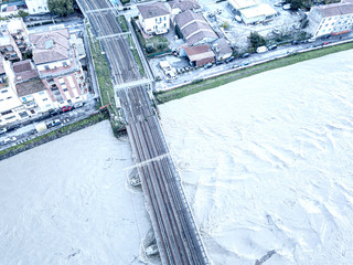 Aerial view of swallen river Arno, Pisa, Italy
