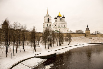 The old medieval fortress is covered with freshly fallen snow. Above the old walls rises the...
