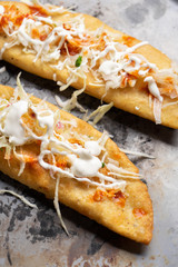 Mexican empanadas with cabbage and red sauce