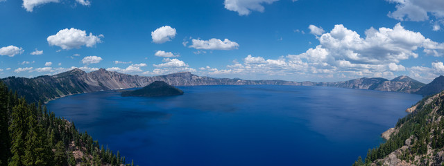 Panoramic views of a caldera known as Crater Lake in Oregon