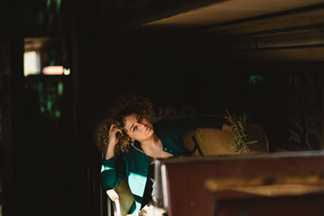Fototapeta na wymiar girl sitting in abandoned train