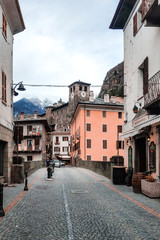Aosta valley, Piedmont, Italy - Picturesque Bard town with colorful buildings known for the iconic snow-capped peaks like Mont Blanc, Monte Rosa, Gran Paradiso and ski resort Courmayeur. 