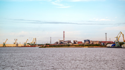 Fototapeta na wymiar Sailing on the northwest river along the territory of plant