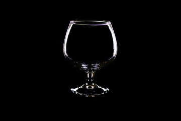 Cognac glass on a black background