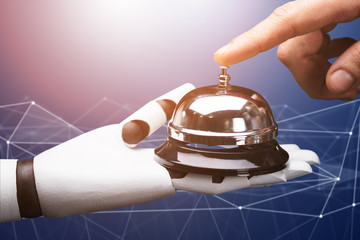 Person Ringing Service Bell Hold By Robot