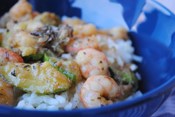 Shrimp risotto with zucchini close up