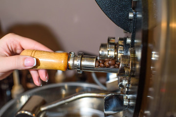 Roasting coffee beans in one of the young and promising coffee houses