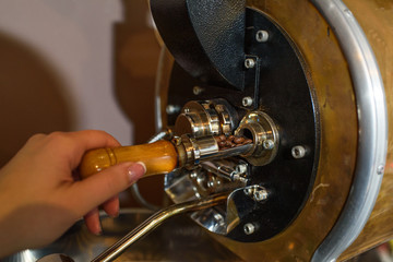 Roasting coffee beans in one of the young and promising coffee houses