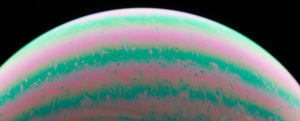 Purple and green liquid background