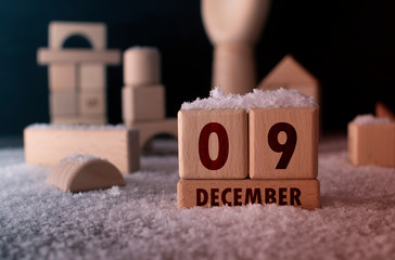 December 9 written with wooden blocks