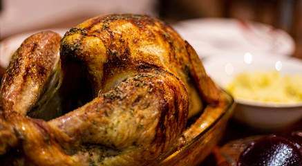Turkey on the table in preparation for a Christmas or Thanksgiving feast