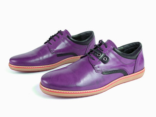 Pair of male purple leather shoes on white background, isolated product, top view.