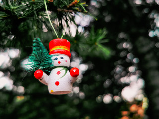 snowman christmas ornament on the christmas tree