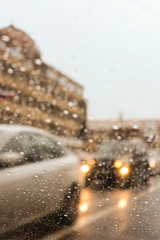 Rainy day bokeh background scenes at roads of Baku