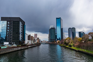Fototapeta premium Osaka Business Park seen from the bridge over the Neyagawa River.