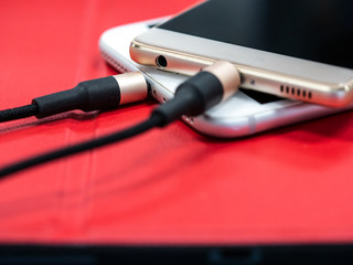 Portable of smart phones  on the table for charging