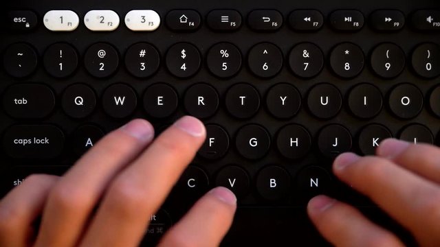 Closeup view of typing hands