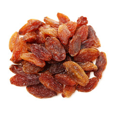 brown raisins on a white background