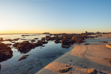 Fototapeta premium gorgeous sunset on a rocky rugged coast