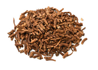 Dried medicinal herbs raw materials isolated on white. Root of Taraxacum, known as dandelions